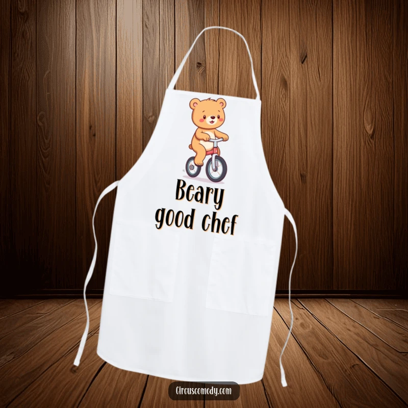 Funny apron featuring a playful bear riding a unicycle, perfect for adding cheer and humor to cooking tasks.