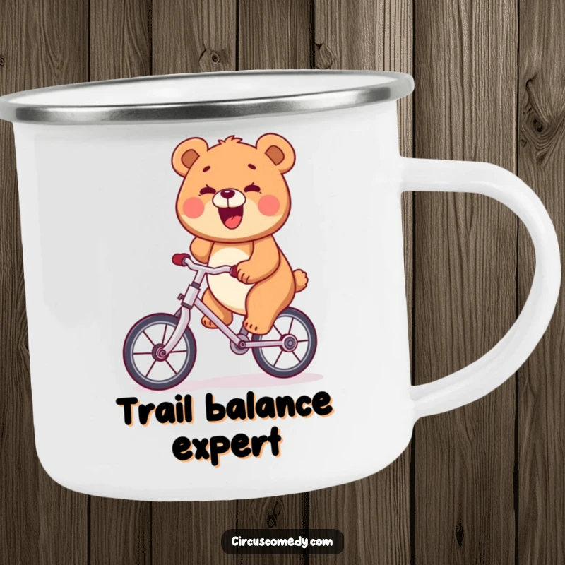 Funny bear with a big smile riding a unicycle in a camping setting, durable speckled mug, humorous outdoor gear.