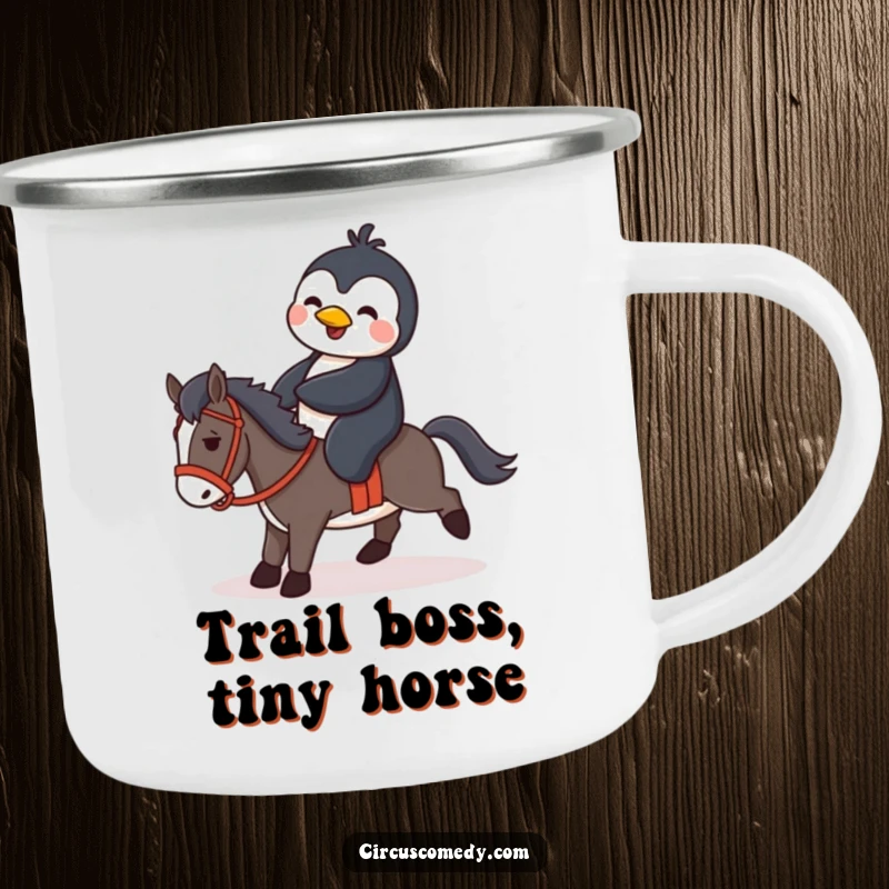 Funny penguin attempting to ride a small horse, printed on a sturdy camping mug for humorous outdoor enjoyment.