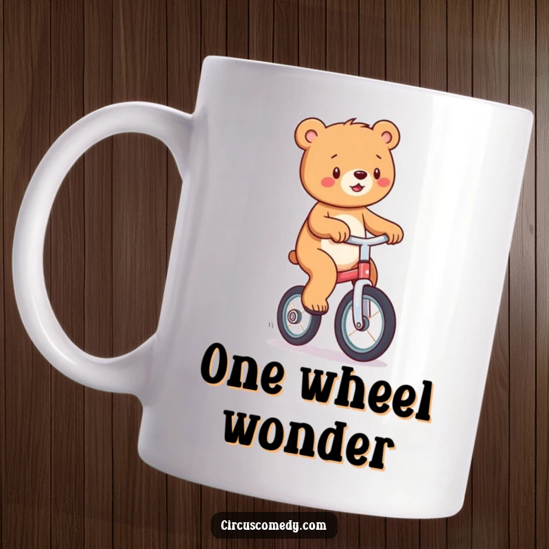Funny mug depicting a playful bear with a grin, confidently riding a unicycle with impressive balance.