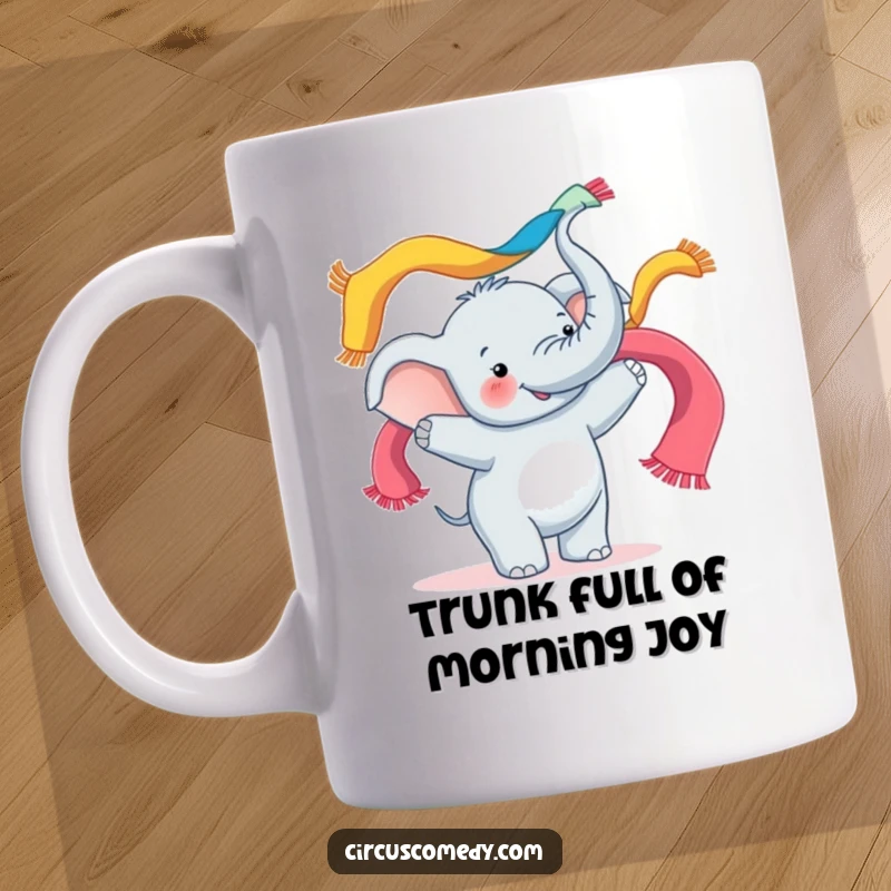 Funny mug showcasing a happy elephant expertly juggling colorful scarves with its trunk, radiating pure delight and amusement.