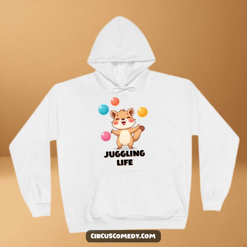 Funny Hoodie: Smiling animal with great focus, expertly juggling colorful balls, conveying skill and playful determination.