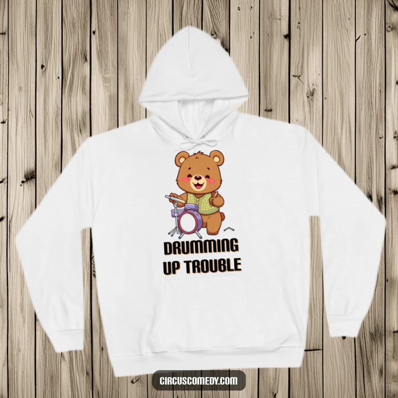 Funny bear wearing a sparkly sequined vest, enthusiastically playing a miniature drum kit with a wide, joyful grin.