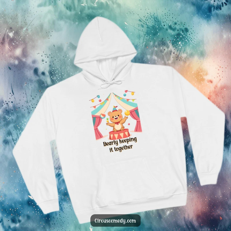 Funny Bear Juggler Circus Hoodie: Snuggle up in this comfy hoodie showcasing a happy bear juggling spectacular balls under a circus tent.