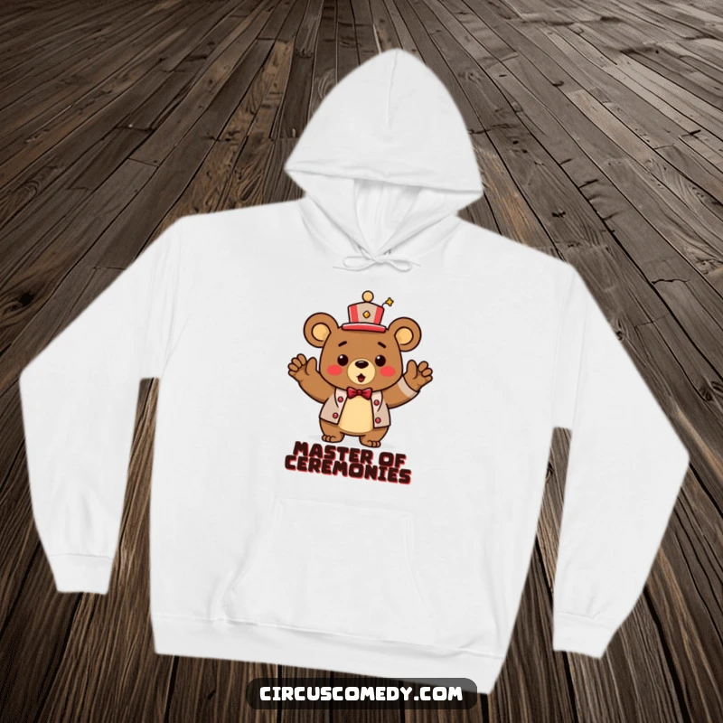 Funny Hoodie: A triumphant bear in a circus ringmaster hat, gracefully taking a bow.