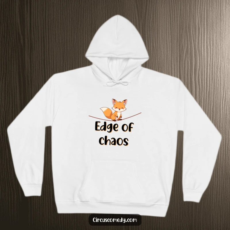 Funny fox hoodie, depicted balancing expertly on a high wire with a cunning look, conveying suspense and humor, a cozy and witty garment.