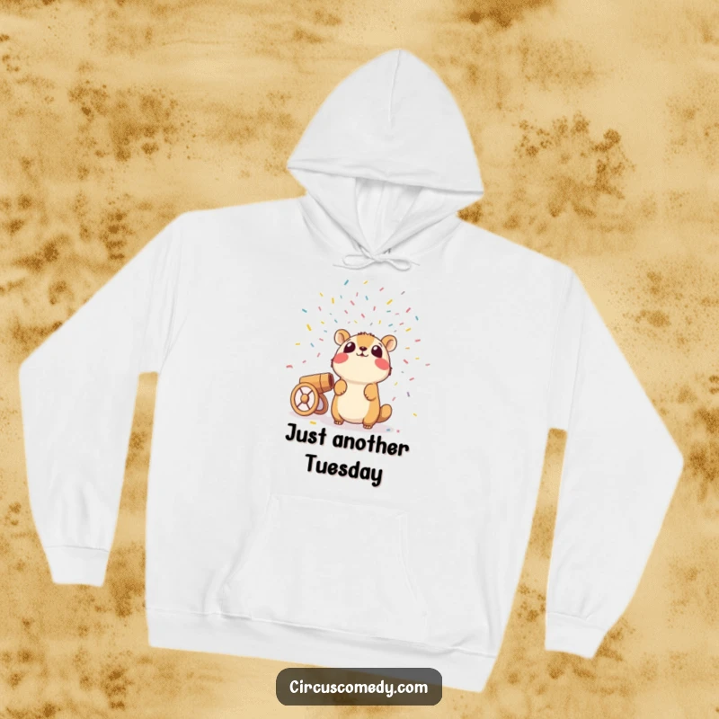 Funny hoodie with a wide-eyed animal surprised by a confetti cannon firing, perfect for a cozy and hilarious gift.