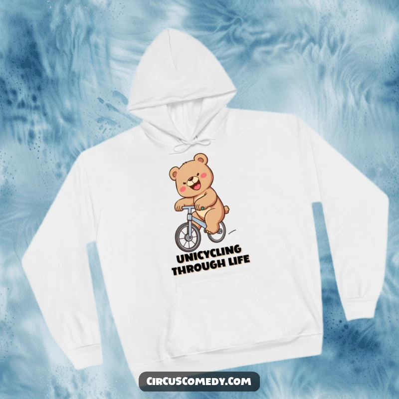 Funny Bear Unicycle Hoodie depicting a joyful bear balancing on a unicycle, offering warmth and humorous motivation, a funny gift.