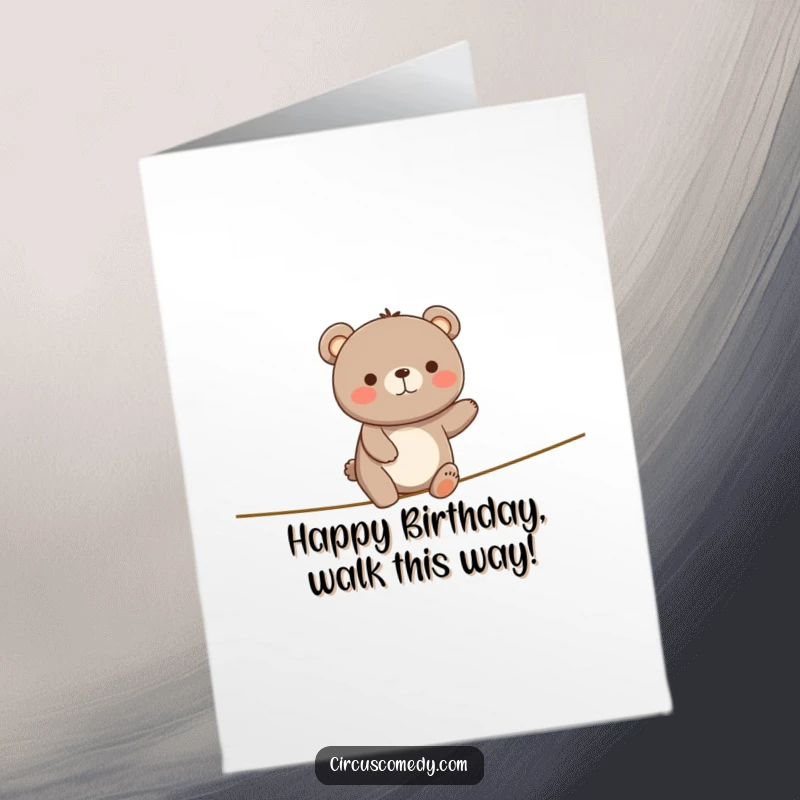 Funny Free Printable Birthday Card: A happy bear wobbles precariously on a tiny tightrope, beaming with joy.