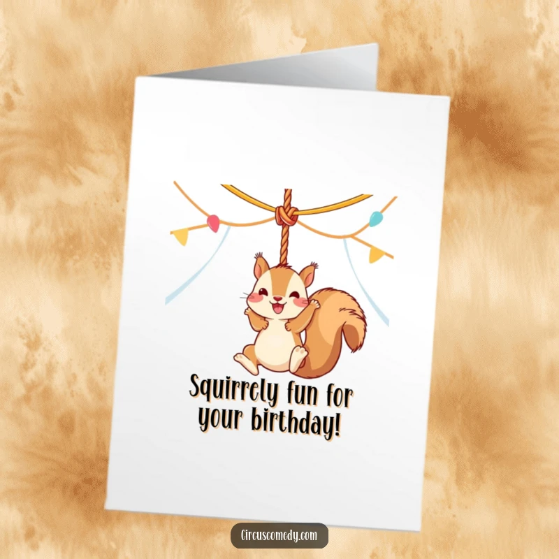 Funny Free Printable Birthday Card: Happy squirrel swinging joyfully from a circus tent rope, celebrating with acrobatic flair.
