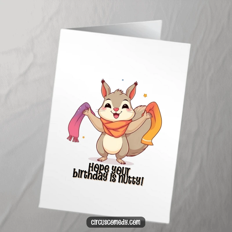 Funny free printable birthday card featuring a cheerful squirrel expertly juggling several brightly colored scarves, radiating happiness.