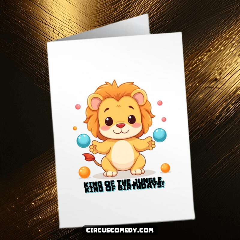Funny Free Printable Birthday Card: Cute lion artistically juggling small, colorful balls with intense focus for a laugh.