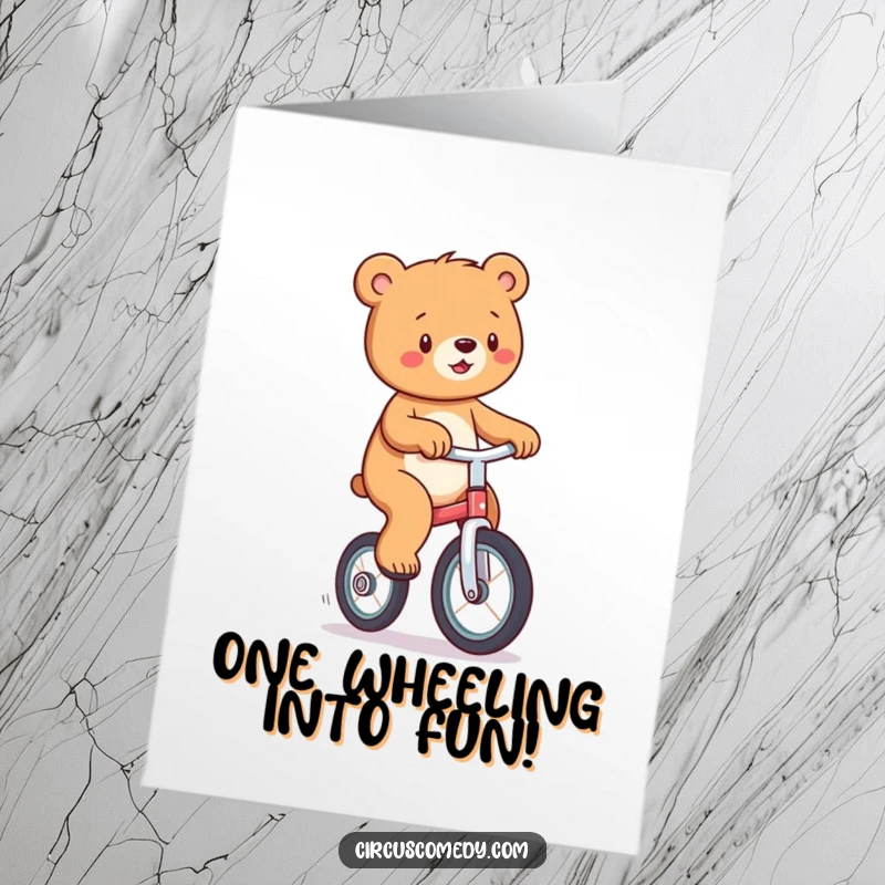 Funny free printable birthday card: A cheerful bear expertly riding a unicycle, bringing birthday joy and laughter.