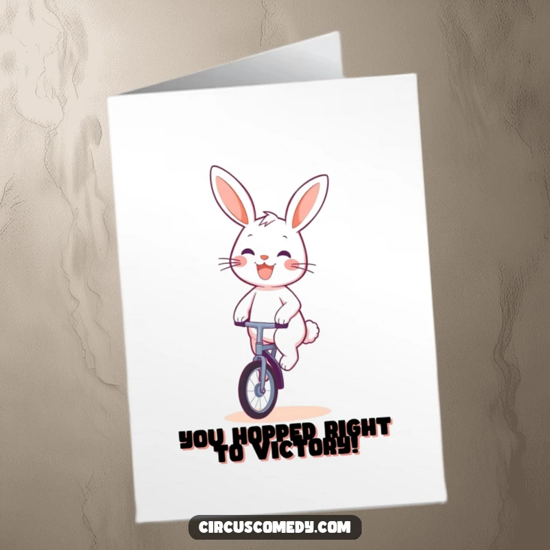 Funny Free Printable Congratulations Card: Cheerful rabbit riding a unicycle, celebrating a successful feat.