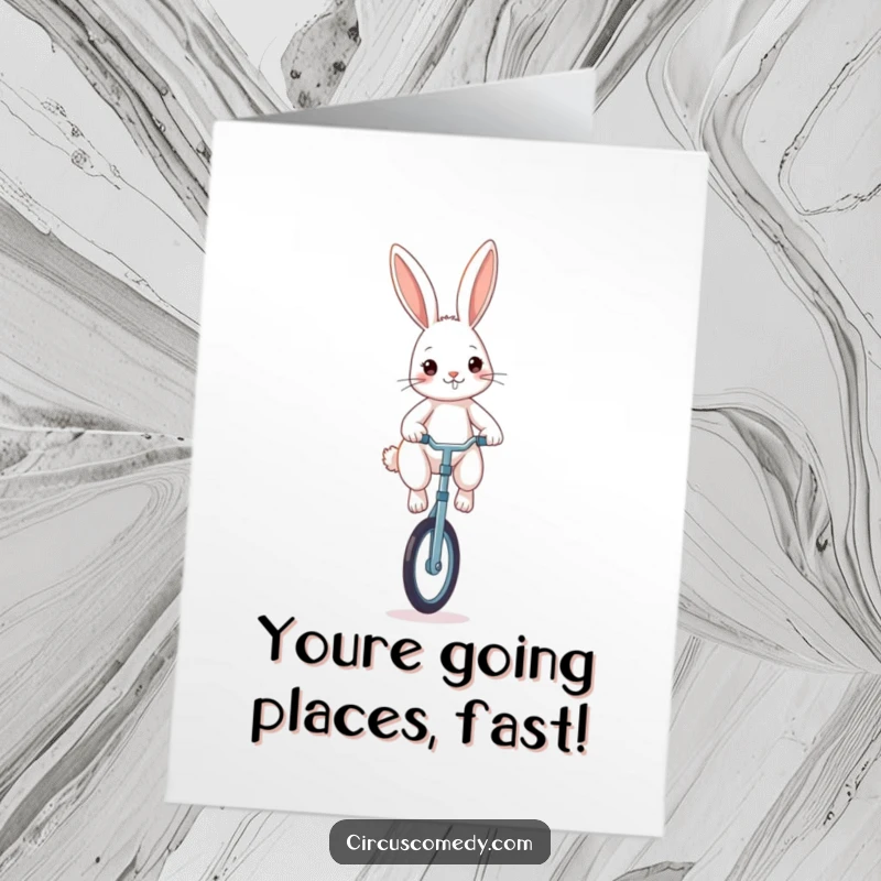 Free Printable Congratulations Card: A determined rabbit skillfully rides a unicycle, symbolizing balance and achievement in a humorous design.
