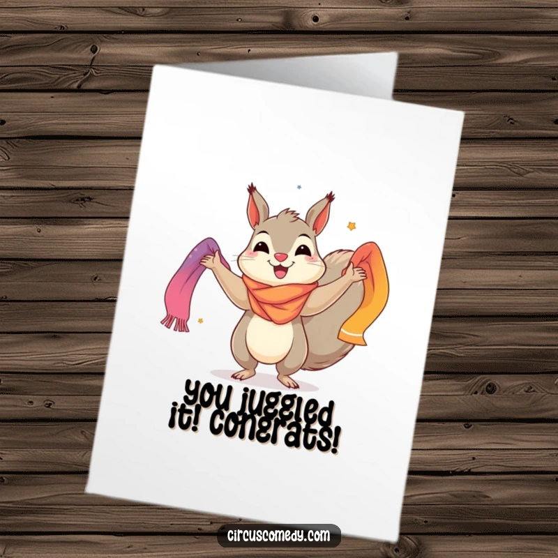 Free printable congratulations card showing a happy squirrel skillfully juggling multiple colorful scarves, symbolizing juggling success and celebration.