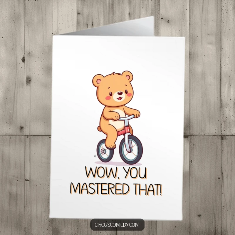 Funny free printable congratulations card: A happy bear balancing skillfully on a unicycle, celebrating your incredible achievement.