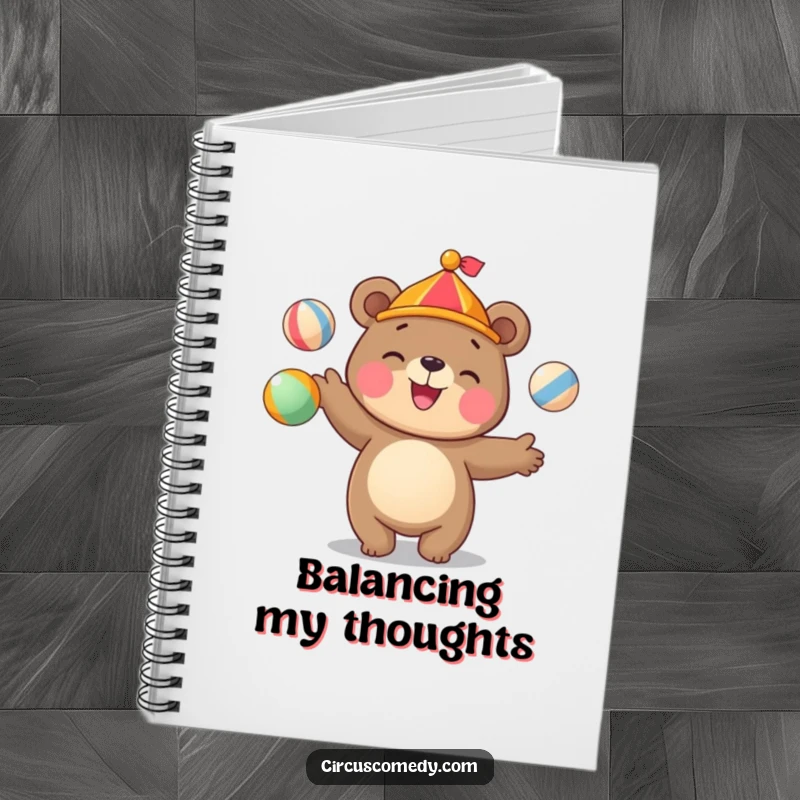 Funny bear notebook with a cute bear juggling colorful circus balls with a happy grin, for jotting notes.
