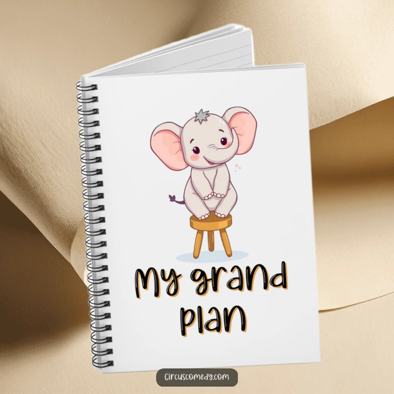 Funny notebook with a happy elephant balancing on a small stool, perfect for capturing inspired thoughts and plans.