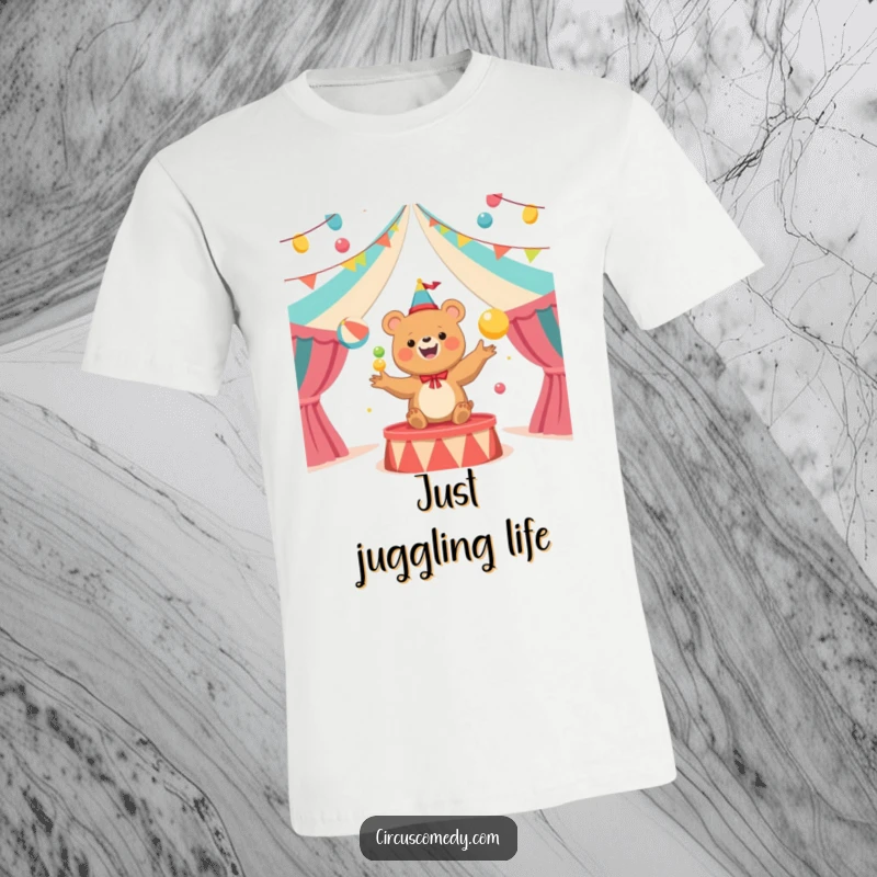 Funny Bear Juggler Circus T-Shirt: A cheerful bear character enthusiastically juggles multiple colorful balls inside a lively circus tent.