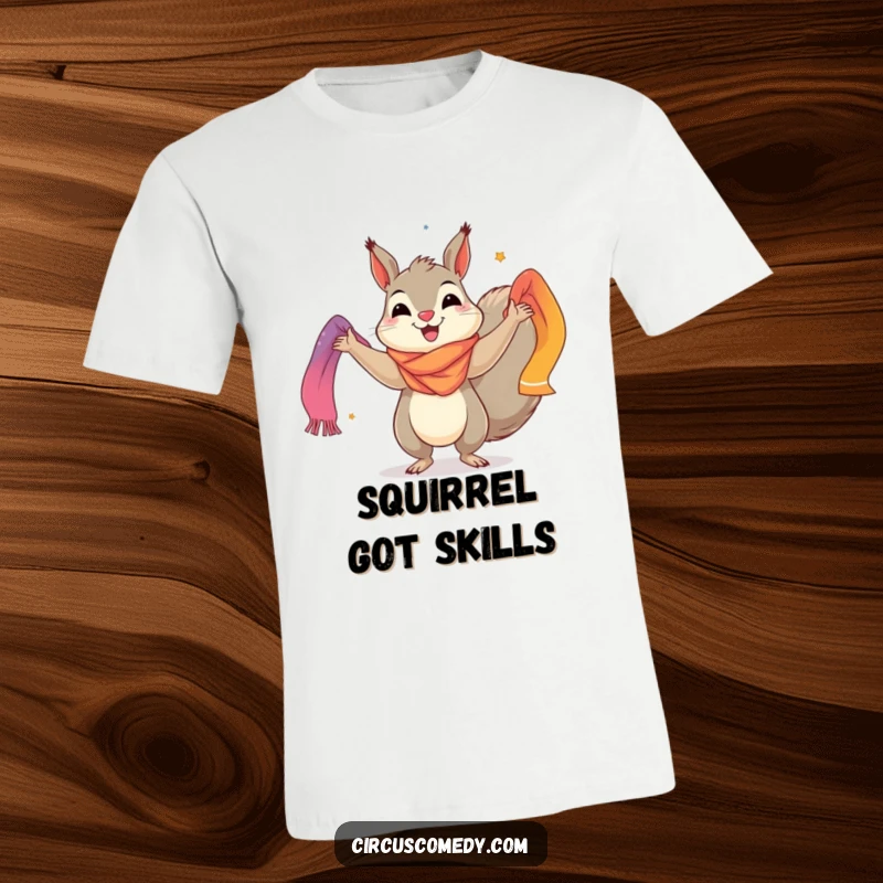 Funny t-shirt featuring a smiling squirrel enthusiastically juggling brightly colored scarves, embodying a sense of fun and lively movement.