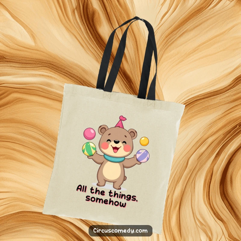 Funny bear tote bag depicting a cute, smiling bear skillfully juggling colorful circus balls, a delightful and functional accessory.