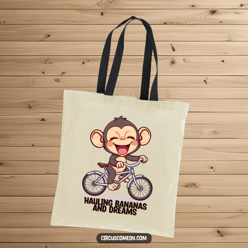 Funny chimp with a huge giggle riding a comically small bicycle, a charming and humorous tote bag for everyday use.
