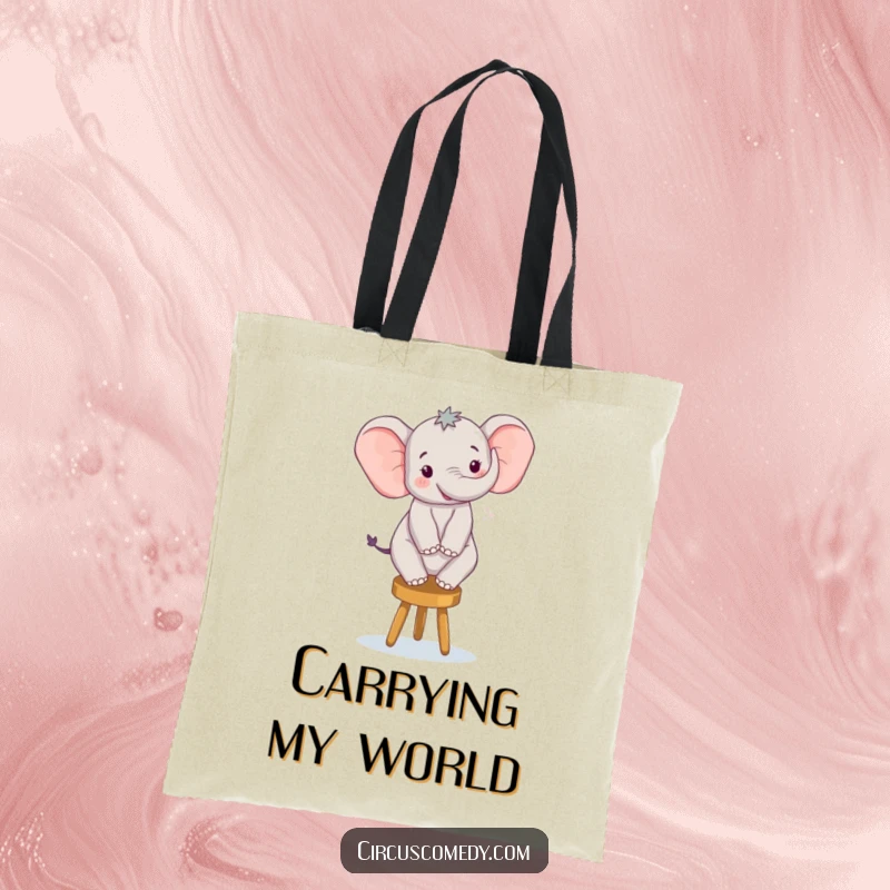 Funny tote bag with a happy elephant artistically balancing on a small, unstable-looking stool, full of glee.