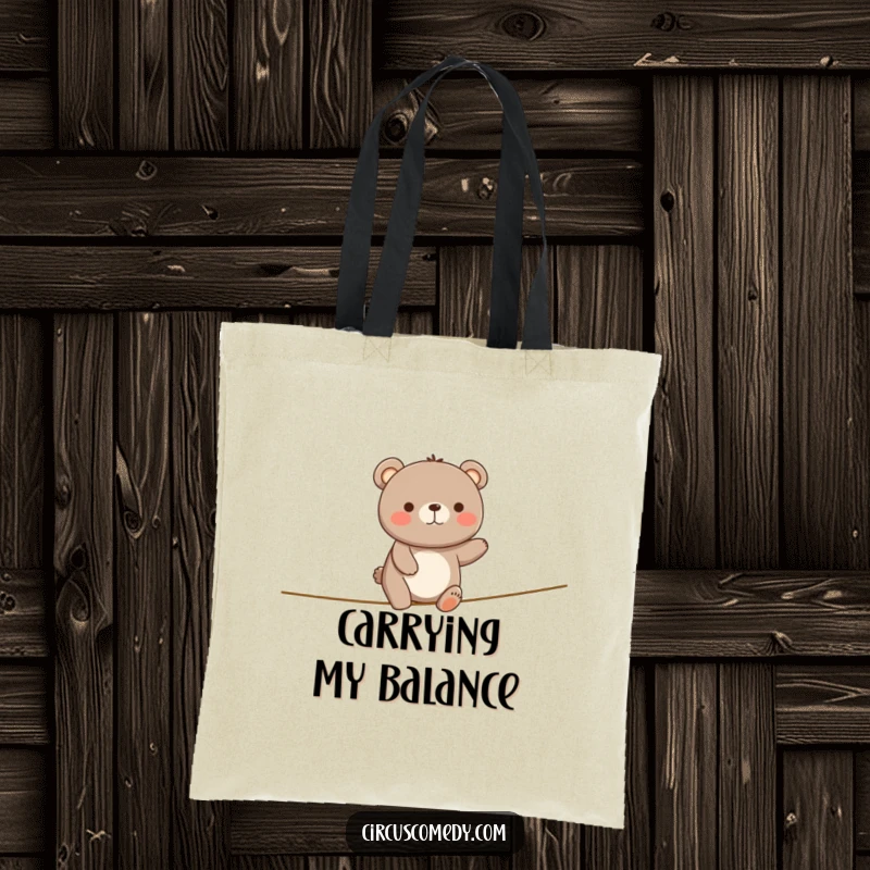 Funny Happy Bear Tightrope Tote Bag: A bear wobbles on a tightrope looking happy, a funny and practical tote for essentials.