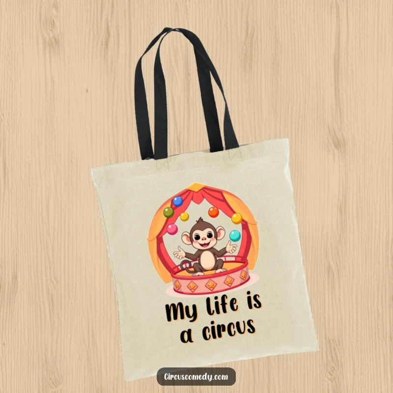 Funny Monkey Circus Tote Bag showing a cute monkey juggling brightly colored balls in a performance setting, a functional and funny gift.