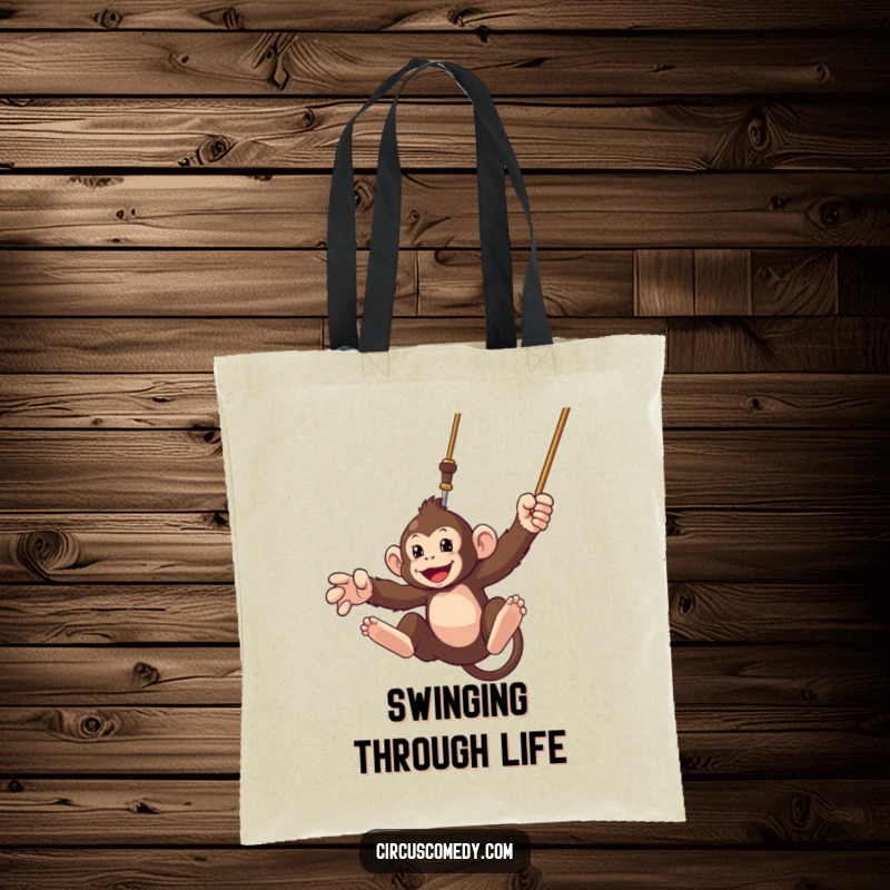 Funny tote bag showcasing a determined monkey swinging from a trapeze, perfect for carrying essentials with a smile.